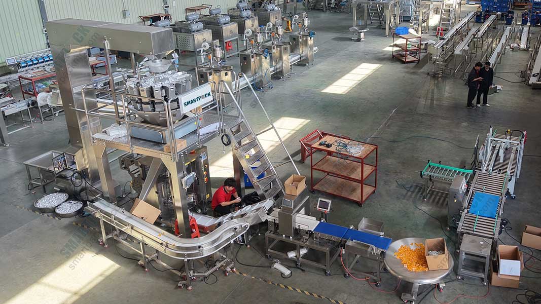 An automated counting multihead weigher feeding into a VFFS machine for secondary packaging