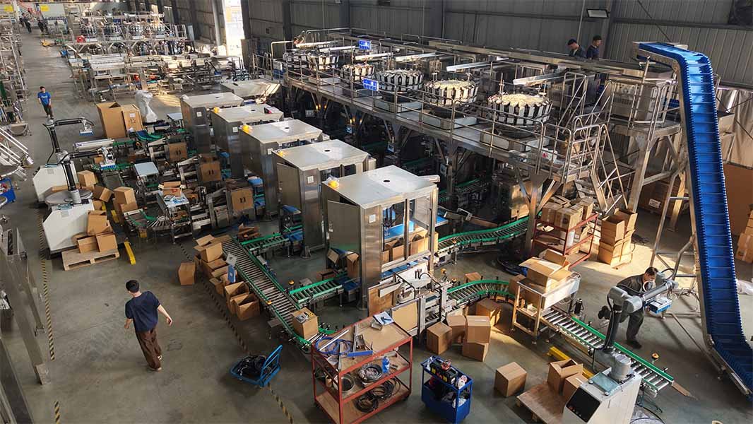 A fully automated end of line system for a snack food factory